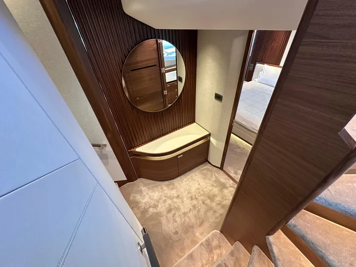  Yacht Photos Pics Luxurious interior of 2025 Princess Y80 yacht with elegant wood paneling and modern design.