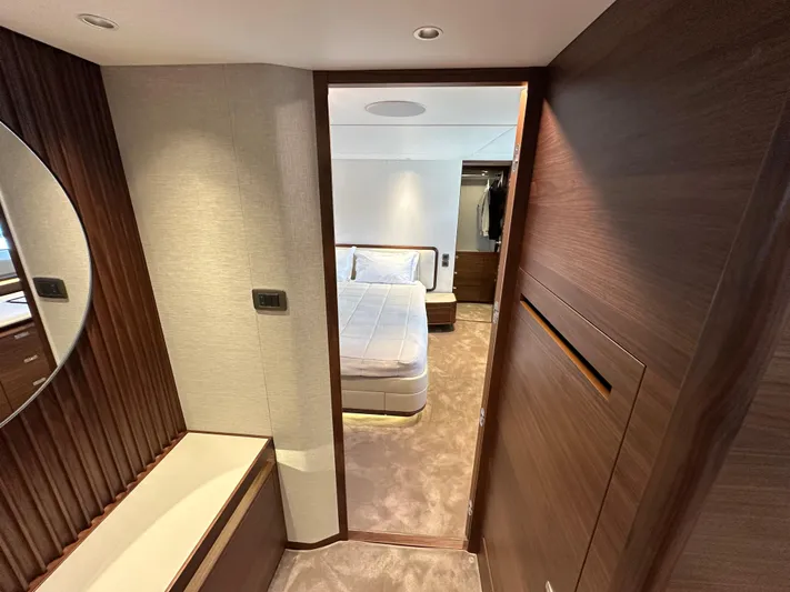  Yacht Photos Pics Luxurious interior of 2025 Princess Y80 yacht featuring elegant bedroom and modern design.