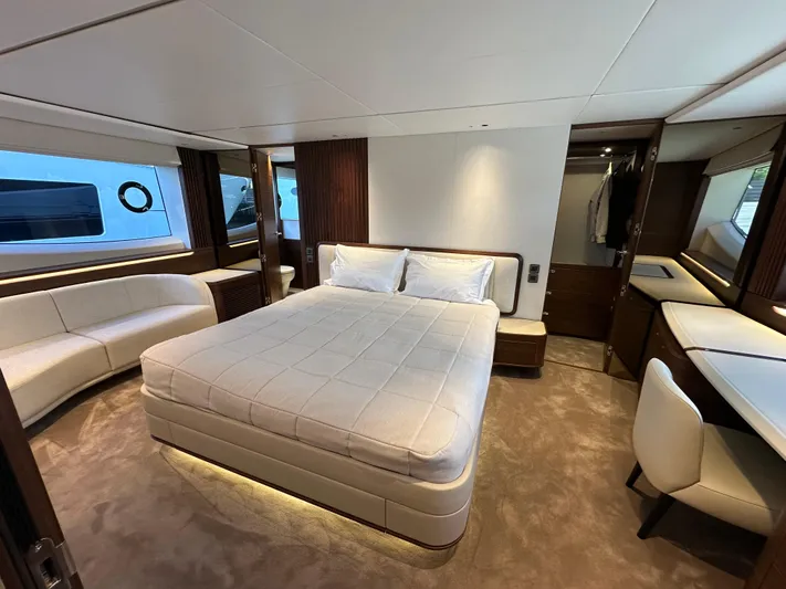  Yacht Photos Pics Luxurious bedroom interior on 2025 Princess Y80 yacht with modern furnishings and elegant design.