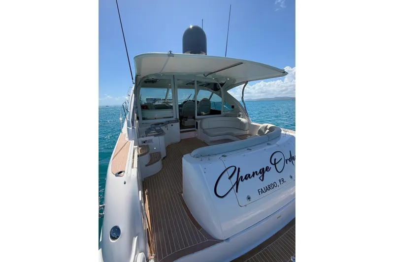  Yacht Photos Pics 2006 Sea Ray 480 Sundancer yacht on open water, featuring spacious deck and seating.