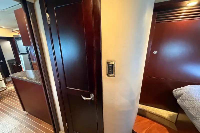  Yacht Photos Pics Interior of 2006 Sea Ray 480 Sundancer yacht with wood paneling and modern amenities.