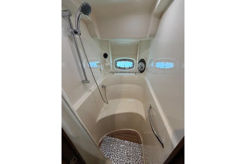  Yacht Photos Pics Luxurious shower area in 2006 Sea Ray 480 Sundancer yacht with modern fixtures.