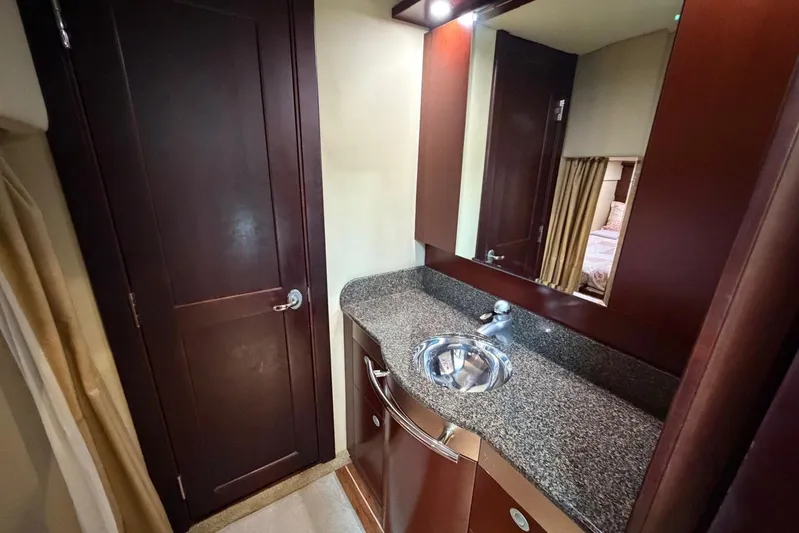  Yacht Photos Pics Luxurious bathroom interior of 2006 Sea Ray 480 Sundancer yacht with granite countertop.