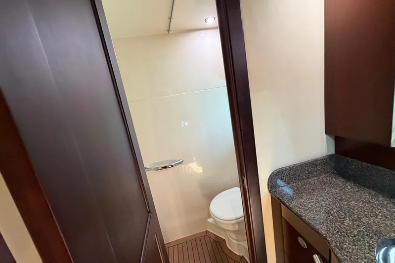  Yacht Photos Pics Bathroom interior of 2006 Sea Ray 480 Sundancer yacht with modern fixtures.