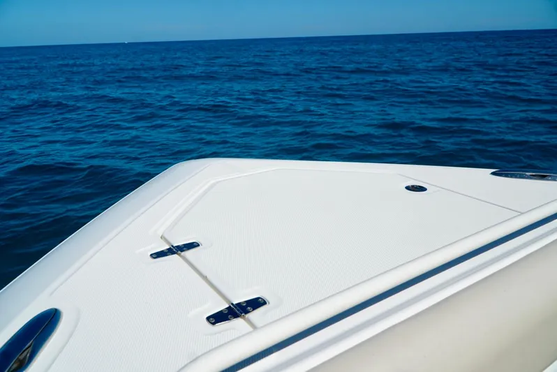  Yacht Photos Pics 2019 Boston Whaler 420 Outrage boat deck on open sea.