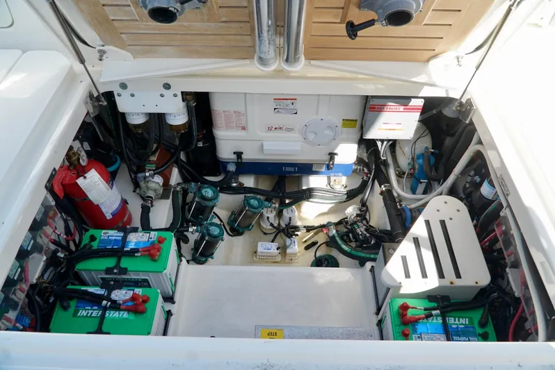  Yacht Photos Pics Engine compartment of 2019 Boston Whaler 420 Outrage with batteries and equipment.