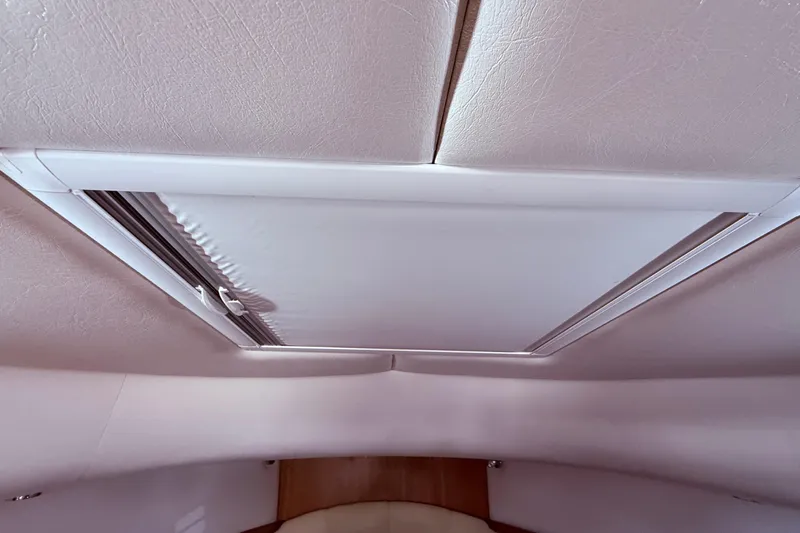 Tova Yacht Photos Pics Ceiling hatch inside 2007 Legacy Yachts 32 Sedan, featuring a sleek, modern design.