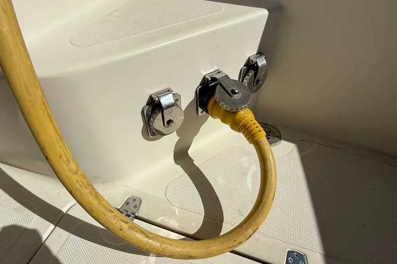 Tova Yacht Photos Pics Yellow power cable connected to a 2007 Legacy Yachts 32 Sedan.