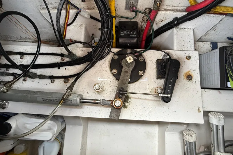 Tova Yacht Photos Pics Engine compartment of a 2007 Legacy Yachts 32 Sedan with visible wiring and components.