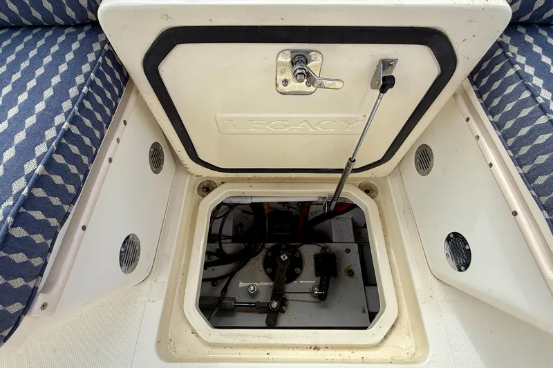 Tova Yacht Photos Pics Open hatch on 2007 Legacy Yachts 32 Sedan, revealing mechanical components.