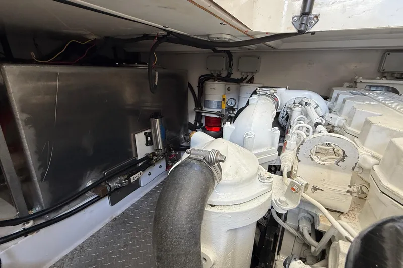 Tova Yacht Photos Pics Engine room of 2007 Legacy Yachts 32 Sedan, showcasing mechanical components and systems.