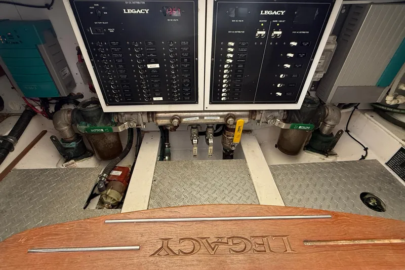 Tova Yacht Photos Pics Electrical panel of 2007 Legacy Yachts 32 Sedan, showcasing control systems and wiring.