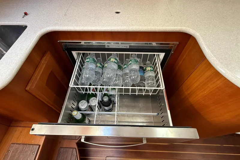 Tova Yacht Photos Pics Refrigerator drawer with drinks in 2007 Legacy Yachts 32 Sedan galley.