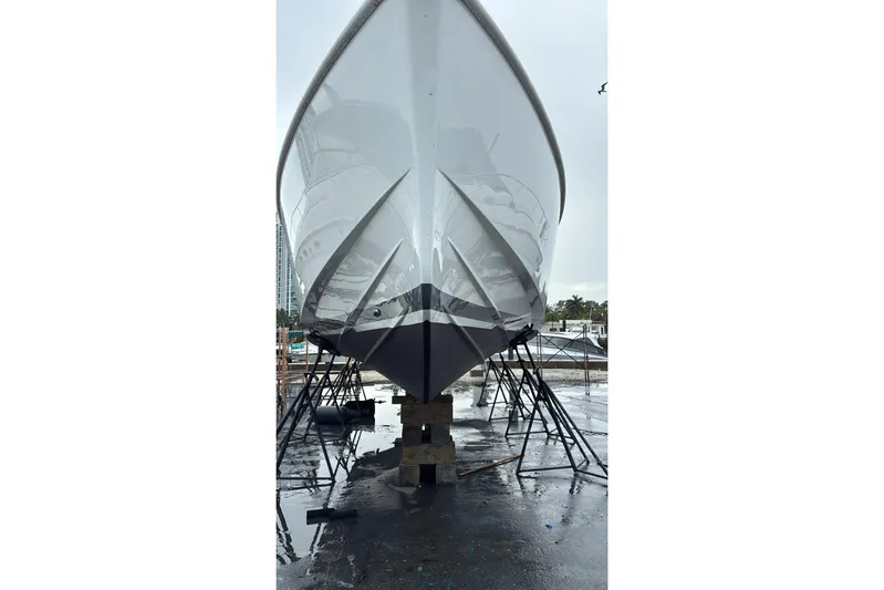 No Name Yacht Photos Pics 2019 Fjord 38 boat on dry dock, viewed from the front.