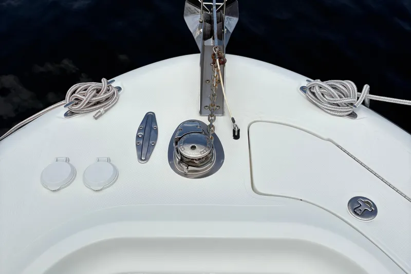 5 O'clock Somewhere Yacht Photos Pics 2007 Hydra-Sports Vector 3300 CC boat deck with anchor and ropes.