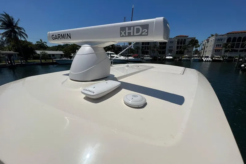  Yacht Photos Pics 2024 Scout 355 LXF boat with Garmin xHD2 radar in marina.