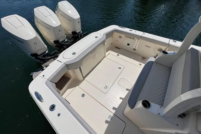  Yacht Photos Pics 2024 Scout 355 LXF boat with triple Mercury outboard engines.