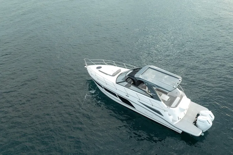  Yacht Photos Pics Aerial view of 2025 Valiatt 380GT luxury boat cruising on open water.
