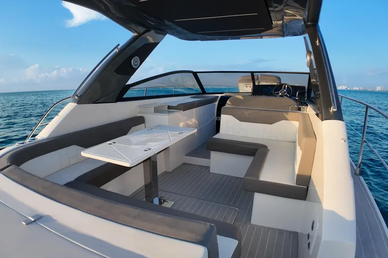  Yacht Photos Pics Luxurious 2025 Valiatt 380GT yacht interior with sleek seating and ocean view.