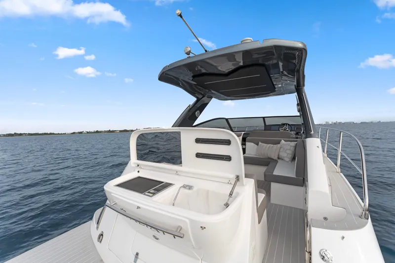  Yacht Photos Pics Luxury Valiatt 380GT yacht, 2025 model, cruising on open water under clear blue skies.