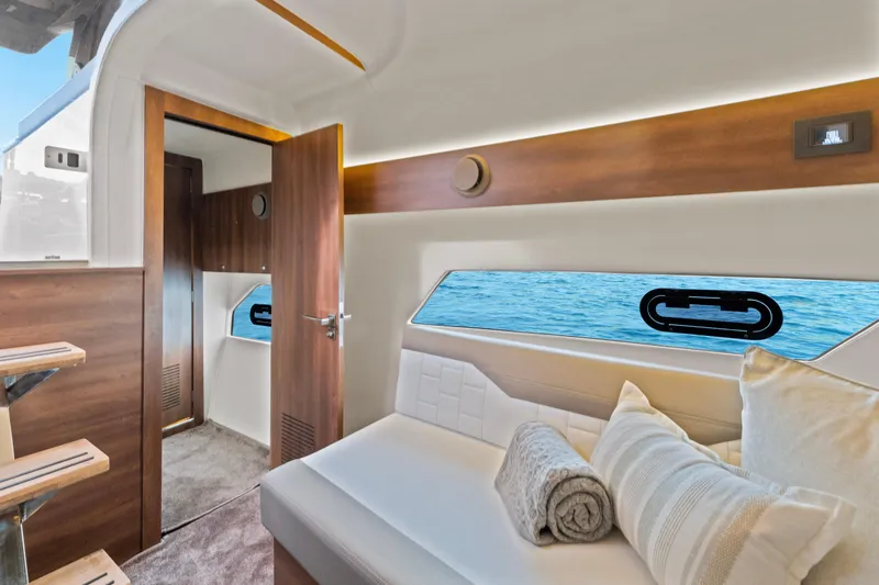  Yacht Photos Pics Luxurious interior of 2025 Valiatt 380GT yacht with elegant wood finishes and ocean view.