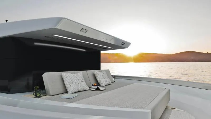 Miami Yacht Photos Pics Luxury yacht Ladenstein L48 MIAMI 2026, featuring elegant deck seating at sunset.