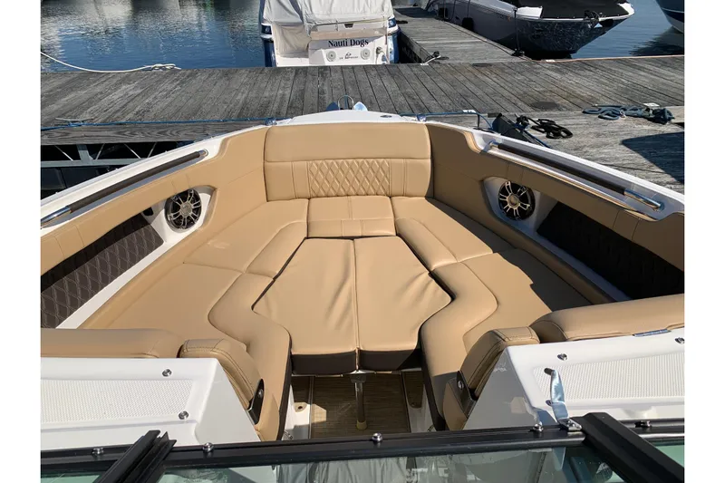  Yacht Photos Pics Luxurious seating area on 2023 Sea Ray SLX 280 boat, docked at marina.