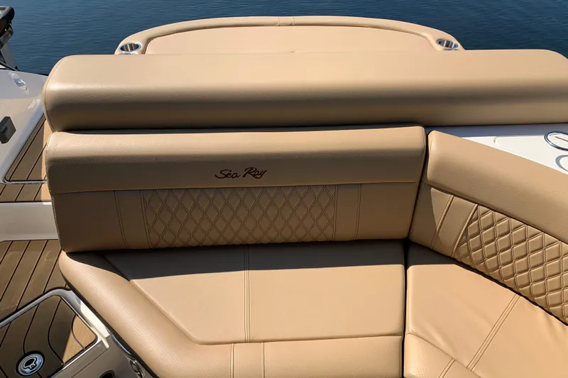  Yacht Photos Pics Luxurious tan seating on 2023 Sea Ray SLX 280 boat, featuring elegant diamond stitching.