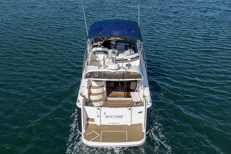 Phantom 42 Yacht Photos Pics 1998 Fairline Phantom 42 yacht cruising on open water, rear view.