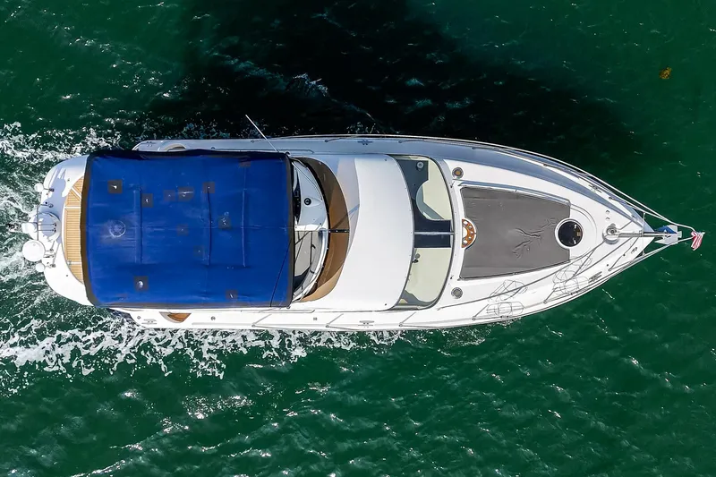 Phantom 42 Yacht Photos Pics Overhead view of 1998 Fairline Phantom 42 yacht cruising on water.