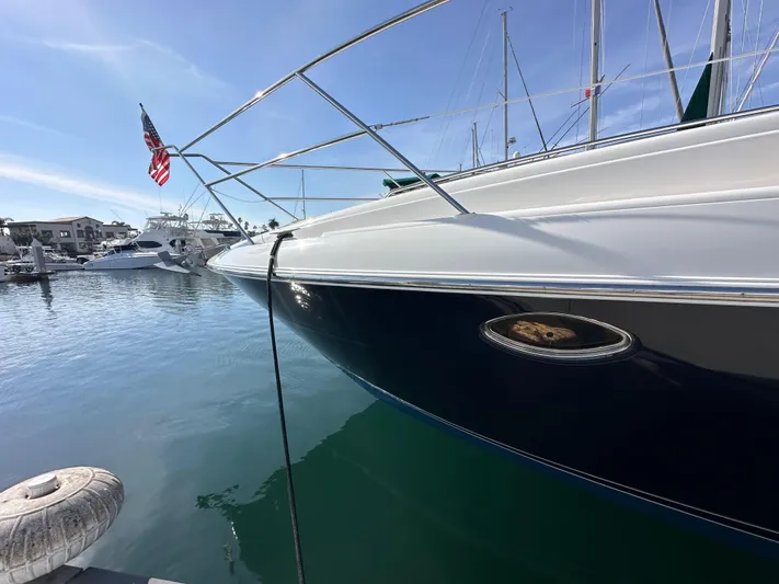 Phantom 42 Yacht Photos Pics 1998 Fairline Phantom 42 yacht docked in a marina, with clear blue skies.