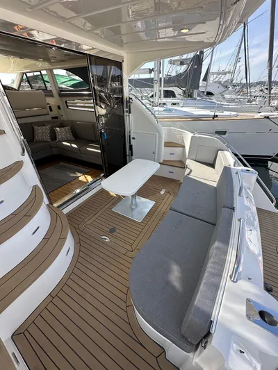 Phantom 42 Yacht Photos Pics 1998 Fairline Phantom 42 yacht with spacious deck and comfortable seating.