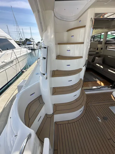 Phantom 42 Yacht Photos Pics Staircase on 1998 Fairline Phantom 42 yacht with teak decking, docked at marina.