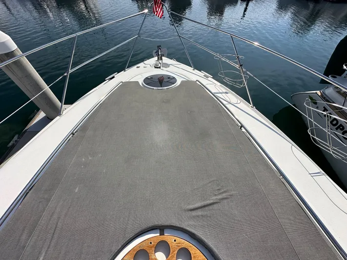 Phantom 42 Yacht Photos Pics Bow view of 1998 Fairline Phantom 42 yacht docked at marina.