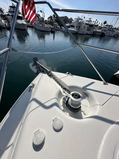 Phantom 42 Yacht Photos Pics 1998 Fairline Phantom 42 yacht bow with anchor, docked in a marina.