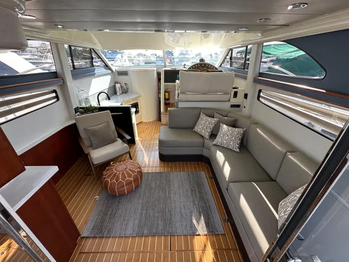 Phantom 42 Yacht Photos Pics Luxurious interior of 1998 Fairline Phantom 42 yacht with modern seating and decor.