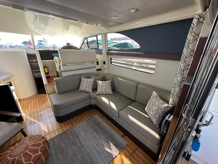 Phantom 42 Yacht Photos Pics Luxurious interior of 1998 Fairline Phantom 42 yacht with modern seating and decor.