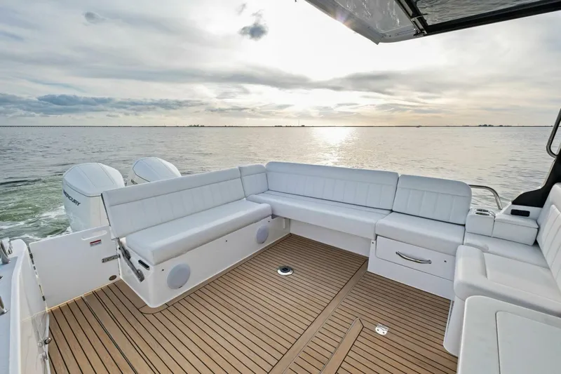  Yacht Photos Pics Luxury MJM 42 boat interior, 2025 model, with spacious seating and scenic ocean view.