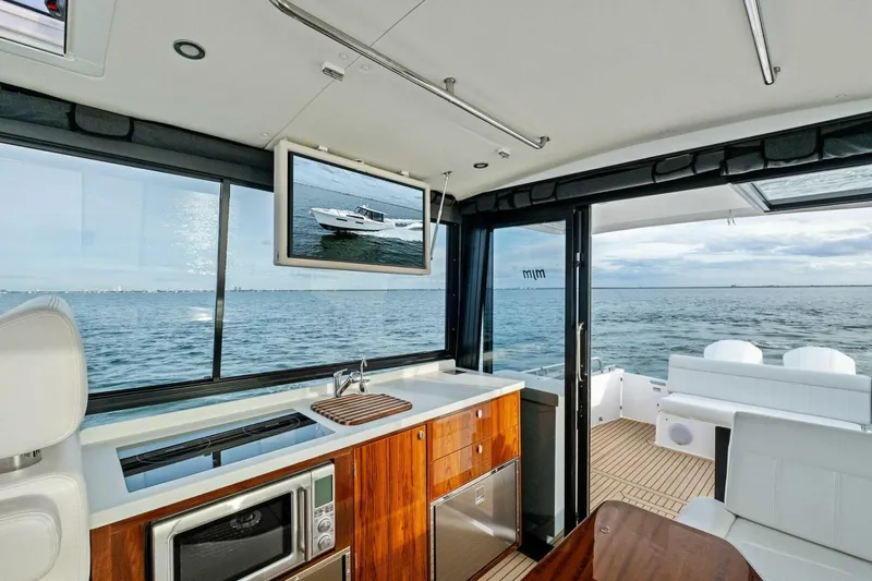  Yacht Photos Pics Luxurious interior of 2025 MJM 42 yacht with ocean view and modern amenities.