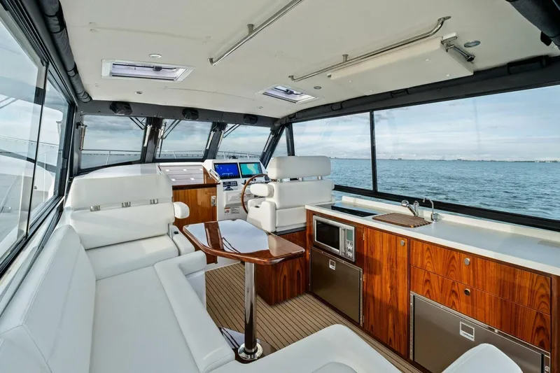  Yacht Photos Pics Luxurious interior of 2025 MJM 42 yacht with modern amenities and ocean view.
