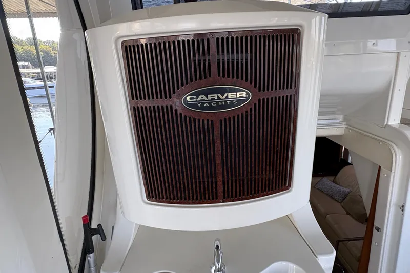  Yacht Photos Pics 2002 Carver 506 Motor Yacht interior with branded panel and seating area.