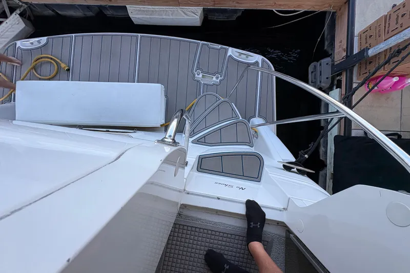  Yacht Photos Pics 2002 Carver 506 Motor Yacht deck with steps and dock view.