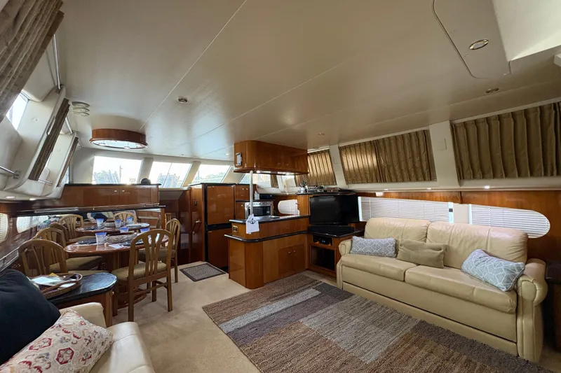  Yacht Photos Pics Luxurious interior of 2002 Carver 506 Motor Yacht with elegant furnishings and ample natural light.