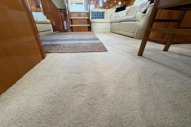  Yacht Photos Pics Luxurious interior of 2002 Carver 506 Motor Yacht with plush carpet and comfortable seating.