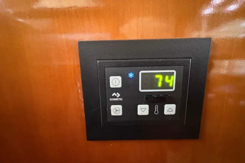  Yacht Photos Pics Digital thermostat on 2002 Carver 506 Motor Yacht, displaying 74 degrees.