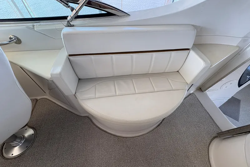  Yacht Photos Pics White leather seating on 2002 Carver 506 Motor Yacht, featuring elegant design and comfort.