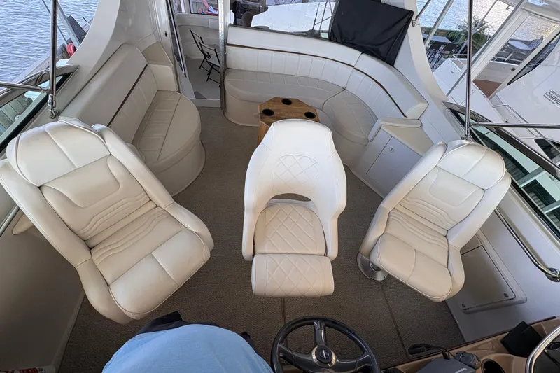  Yacht Photos Pics Luxurious interior of a 2002 Carver 506 Motor Yacht with plush white seating.