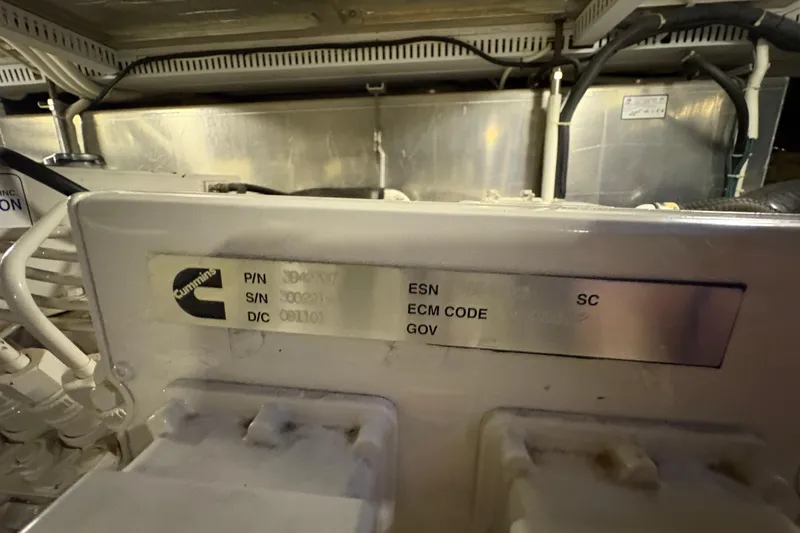  Yacht Photos Pics Engine compartment of 2002 Carver 506 Motor Yacht with Cummins label visible.