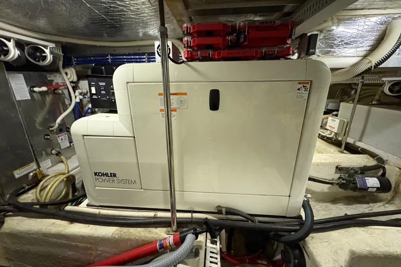  Yacht Photos Pics Engine room of 2002 Carver 506 Motor Yacht with Kohler power system.