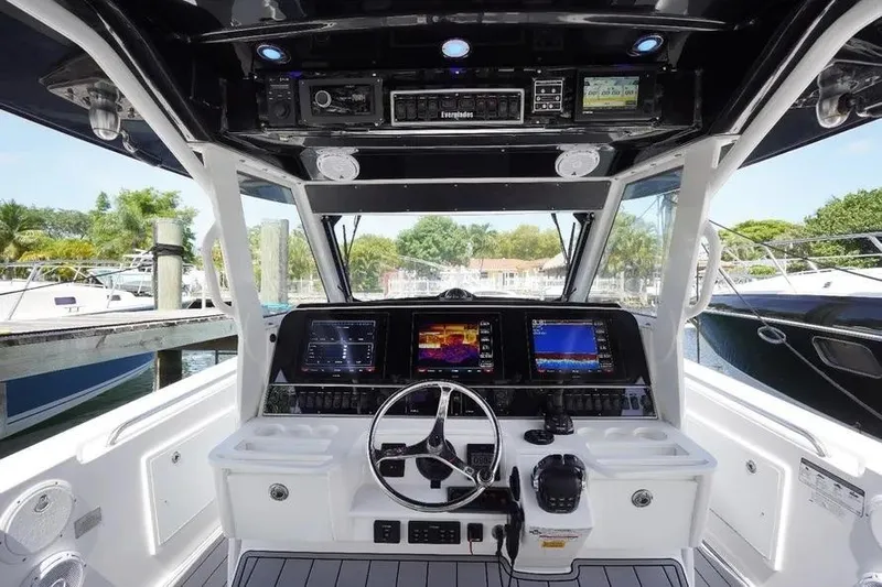  Yacht Photos Pics 2016 Everglades 435 Center Console boat cockpit with advanced navigation displays and controls.
